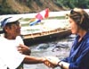 Don Alejandro thanks Donna Runnalls for boat